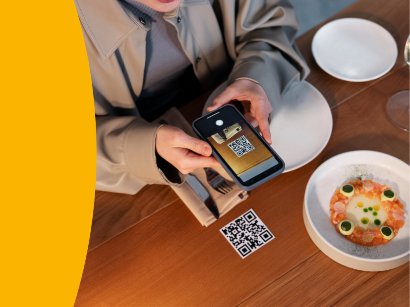 Customer scans QR code with mobile for Hubbo POS contactless ordering.